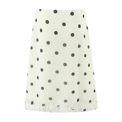 Woman wearing Wave Point Polka Dot Midi Skirt in a city setting