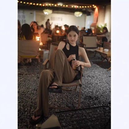 Woman wearing Wine Red Slim Fit Vest in a stylish urban setting