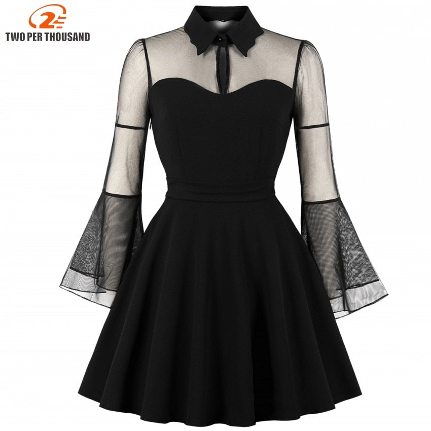 Woman wearing Gothic Mesh Patchwork Flare Sleeve Dress in a party setting