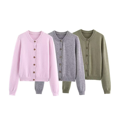 Woman wearing Round Neck Long Sleeved Knitted Cardigan Jacket in a stylish setting