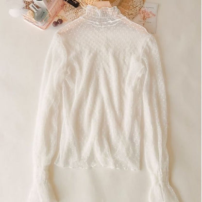 Woman wearing Transparent Korean Lace Blouse in a casual outdoor setting