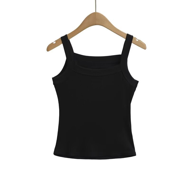 Woman wearing Strap Vest Top in a sunny outdoor setting