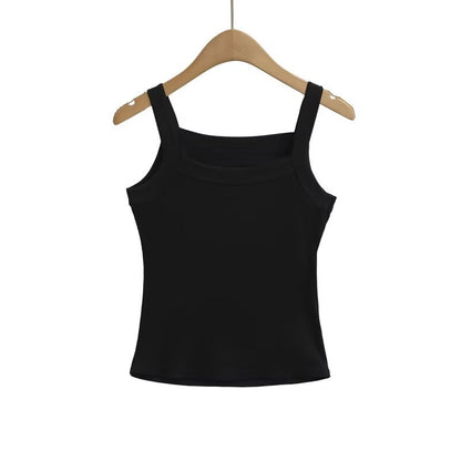 Woman wearing Strap Vest Top in a sunny outdoor setting