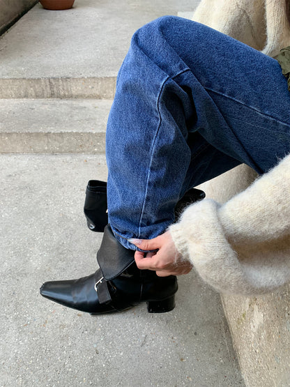 Woman wearing Vintage Casual Straight Leg Jeans in a city setting