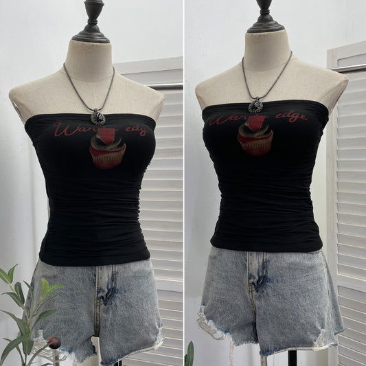 Woman wearing sleeveless mesh top in a casual setting