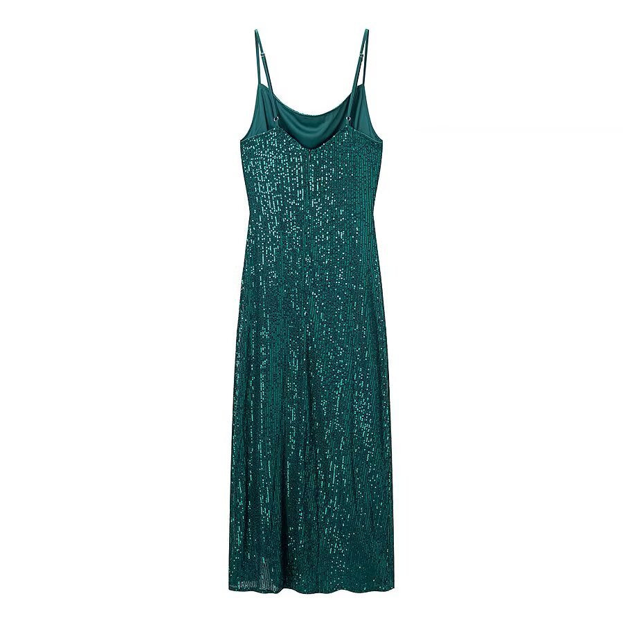 Woman wearing Sexy Sequin Camisole Dress in a stylish evening setting