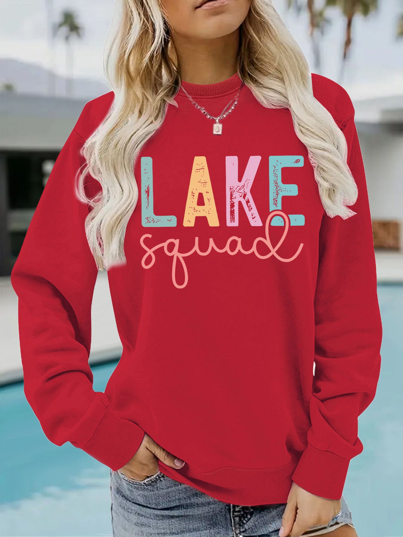 Woman wearing LAKE Printed Hoodie in a casual outdoor setting