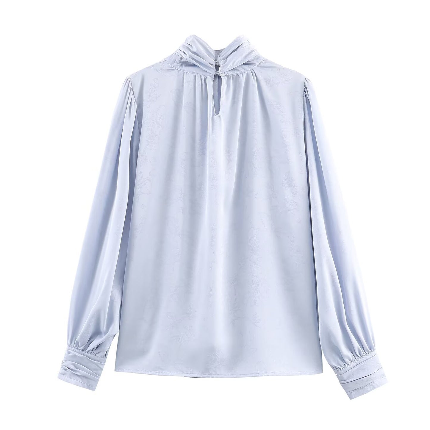 Woman wearing Embroidered Satin Bow Detail Blouse in a chic setting