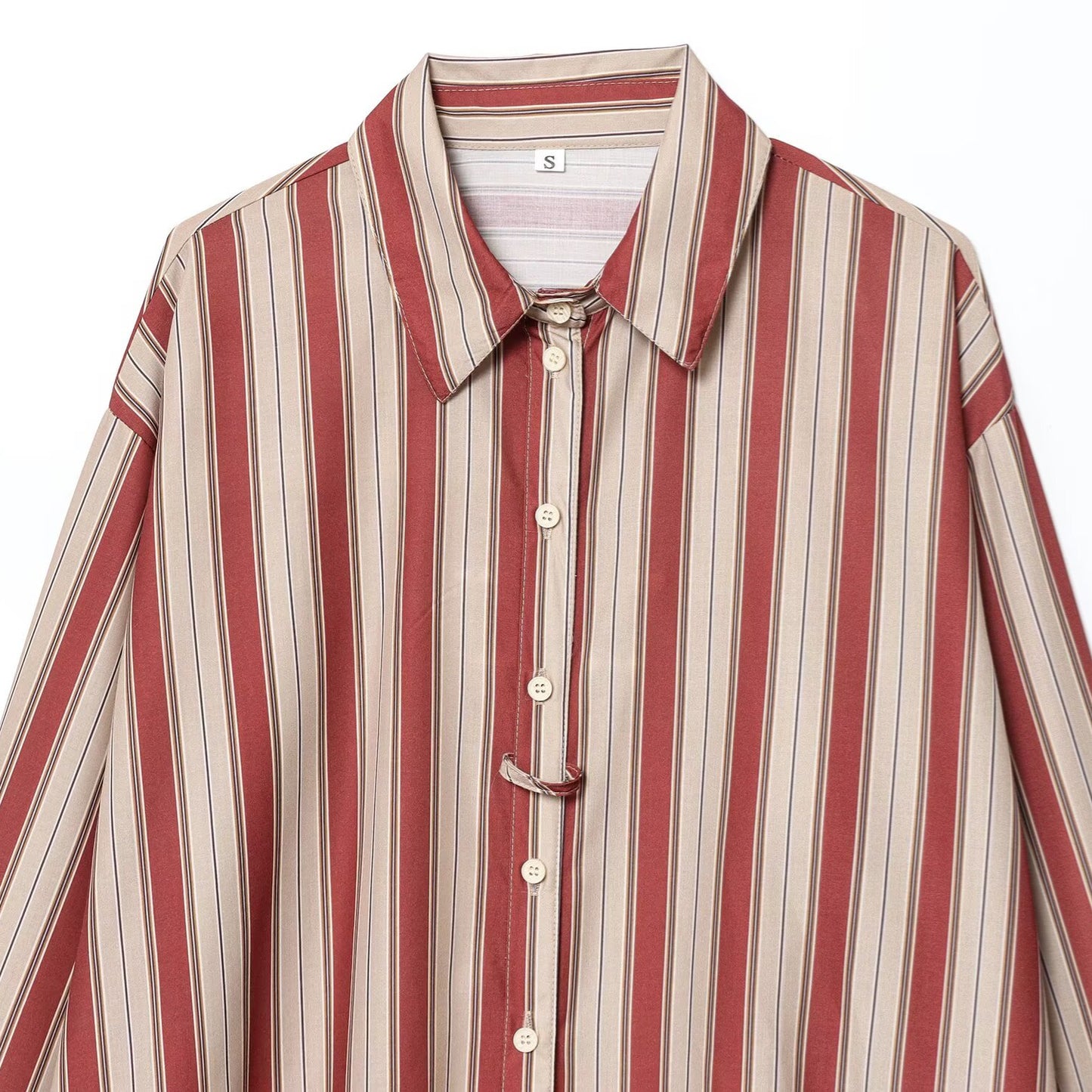 Woman wearing Back Strap Striped Shirt in a casual setting