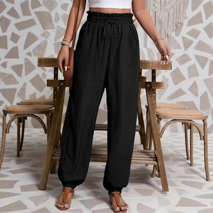 Woman wearing Elastic Solid Color Pants in a casual setting
