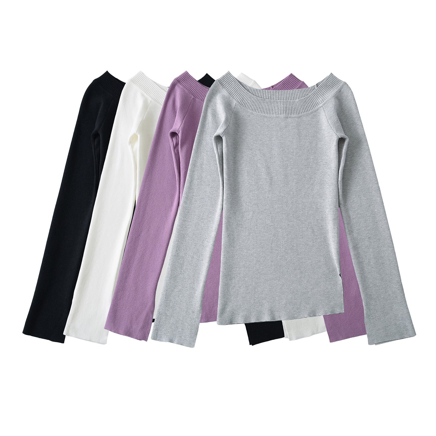 Woman wearing One Shoulder Slit Slanted Hem Top in a stylish setting