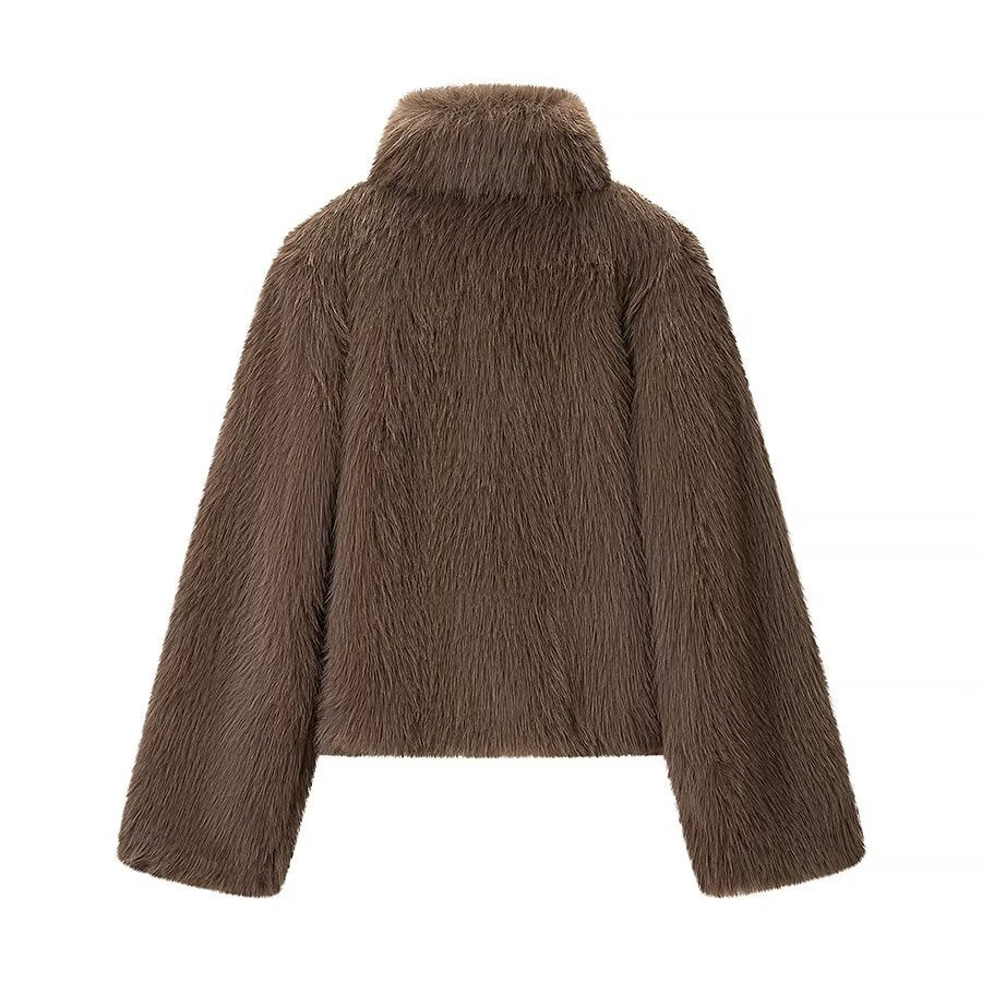 Woman wearing High Neck Long Sleeve Loose Fit Faux Fur Coat in a winter setting