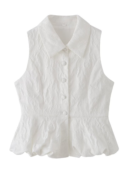 Woman wearing Jacquard Polyester Sleeveless V Neck Top in a sunny outdoor setting