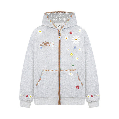 Woman wearing Floral Embroidery Hooded Sweatshirt in a casual setting