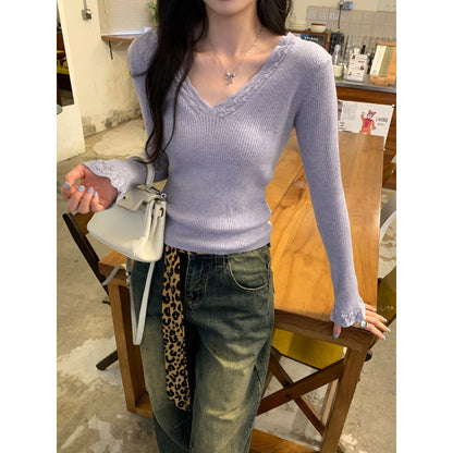 Woman wearing Slim Fit V-Neck Knit Top in a casual setting