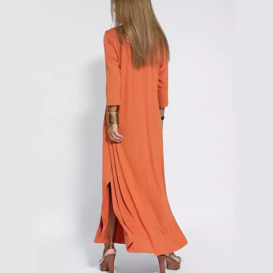 Woman wearing V Neck Three Quarter Sleeve Knit Dress in a stylish urban setting