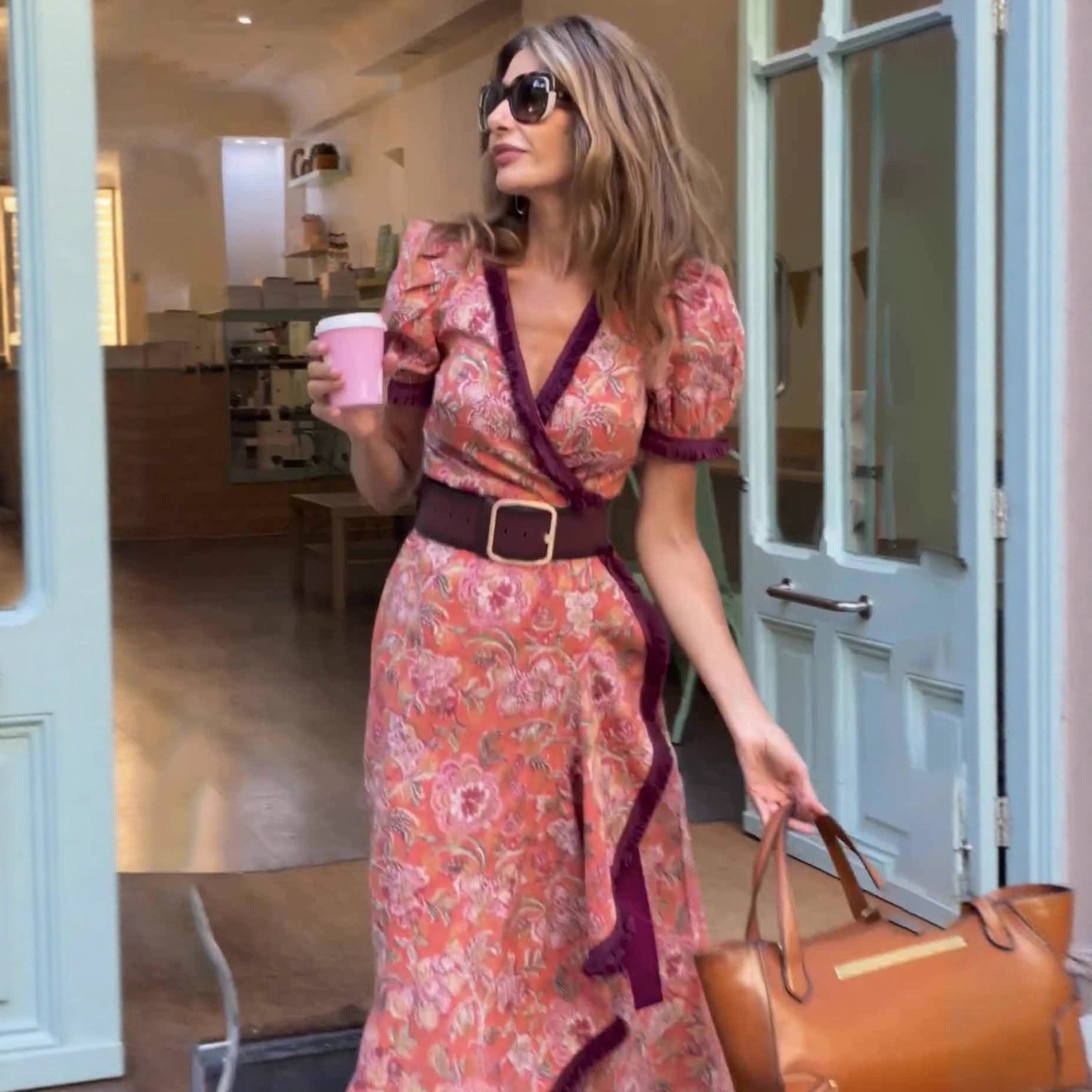 Woman wearing Bohemian Elegant Midi Dress in a garden setting