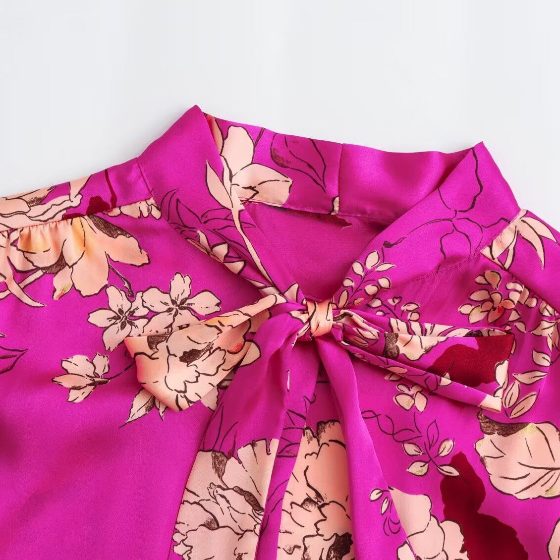 Woman wearing Chic Satin Texture Printed Shirt in a stylish setting