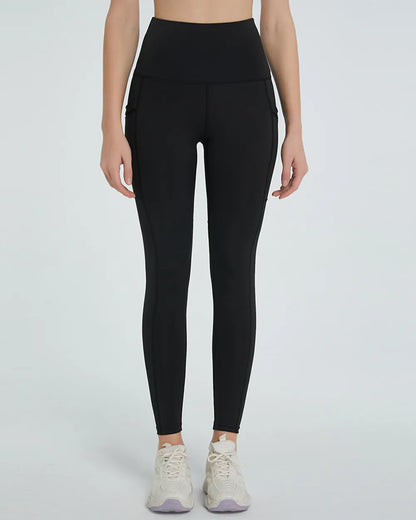 Woman wearing High Waist Active Leggings in a fitness setting