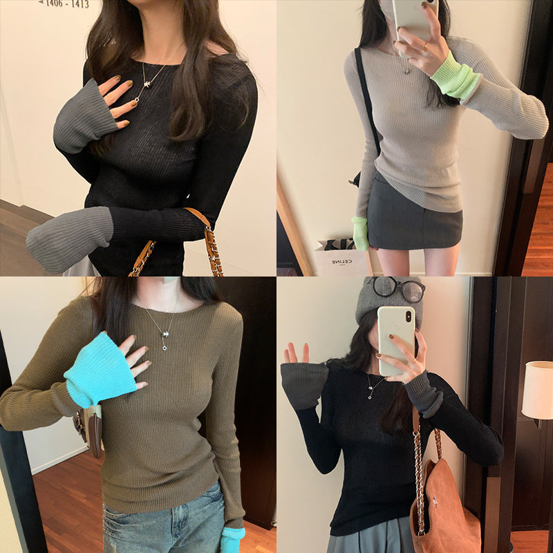 Woman wearing Colour Block Slim Fit Knit Sweater in a stylish urban setting