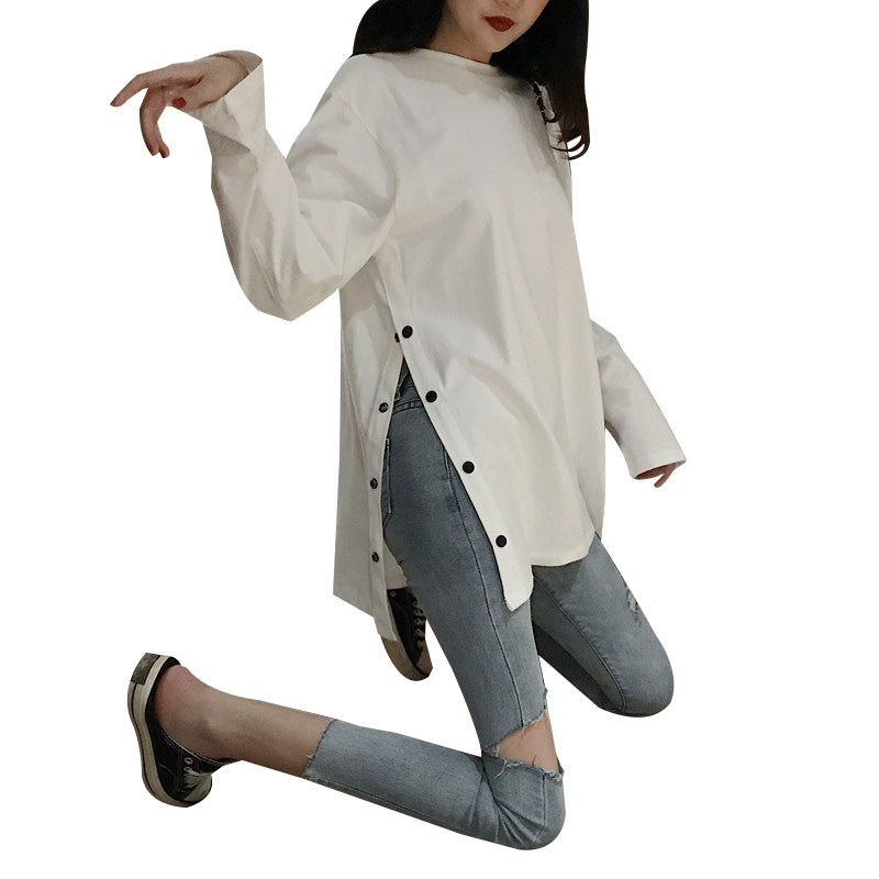 Woman wearing Plus Size Long Sleeve Midi Top in a casual setting