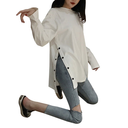 Woman wearing Plus Size Long Sleeve Midi Top in a casual setting