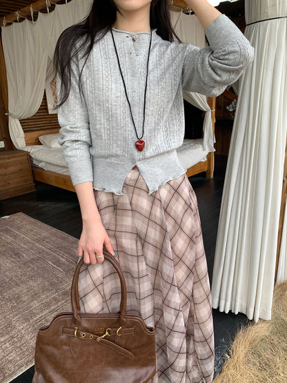 Woman wearing Hollow-Out Knit Cardigan Coat in casual setting