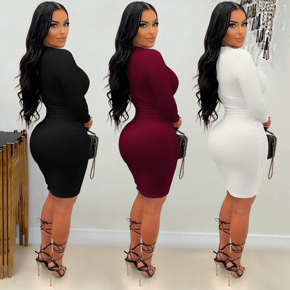 Woman wearing Solid Colour V-Neck Bodycon Midi Dress in a chic setting