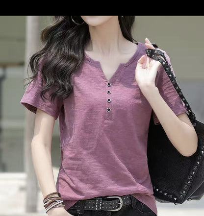 Woman wearing Loose Plus Size V-Neck Short Sleeve Casual T-Shirt in a casual setting