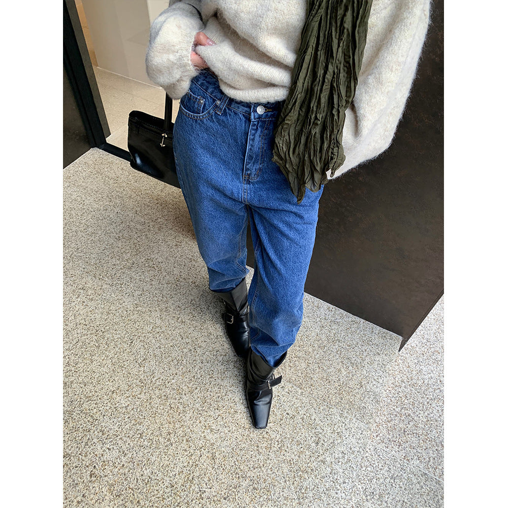 Woman wearing Vintage Casual Straight Leg Jeans in a city setting