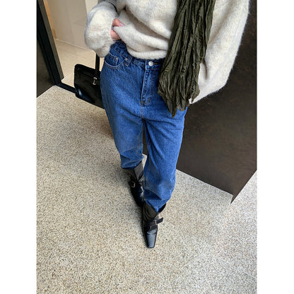 Woman wearing Vintage Casual Straight Leg Jeans in a city setting