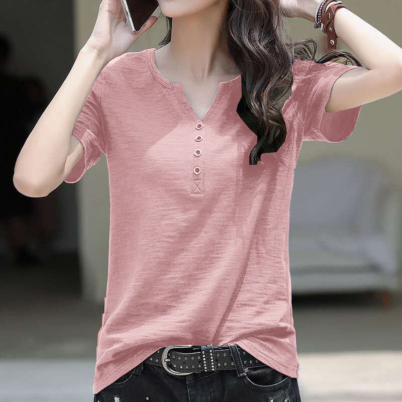 Woman wearing Loose Plus Size V-Neck Short Sleeve Casual T-Shirt in a casual setting