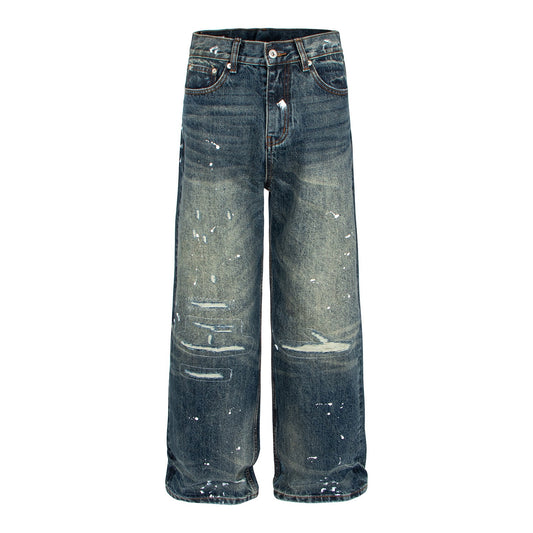 Woman wearing American Vintage Distressed Straight Loose Jeans in an urban setting