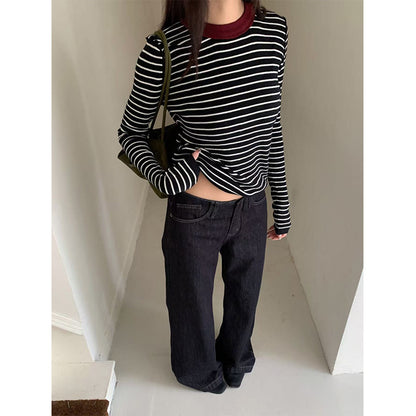 Woman wearing Low Waist Flared Denim Jeans in a casual setting