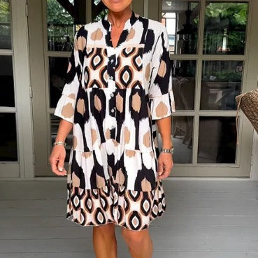 Woman wearing Fresh Print A-Line Patchwork Dress in a sunny outdoor setting