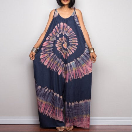 Woman wearing Printed Sleeveless Loose Long Jumpsuit in a casual city setting