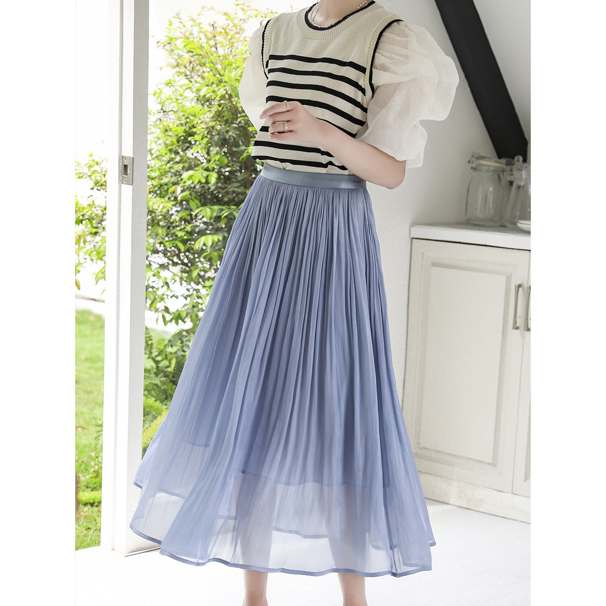 Woman wearing A-Line Skirt in a stylish urban setting