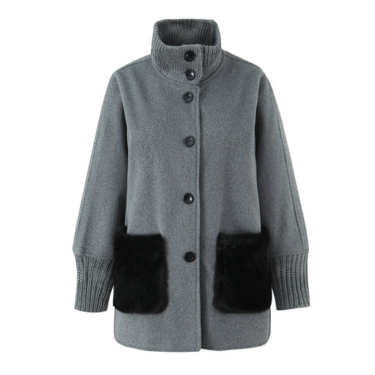 Woman wearing Stand Collar Knitted Patchwork Jacket in a casual setting