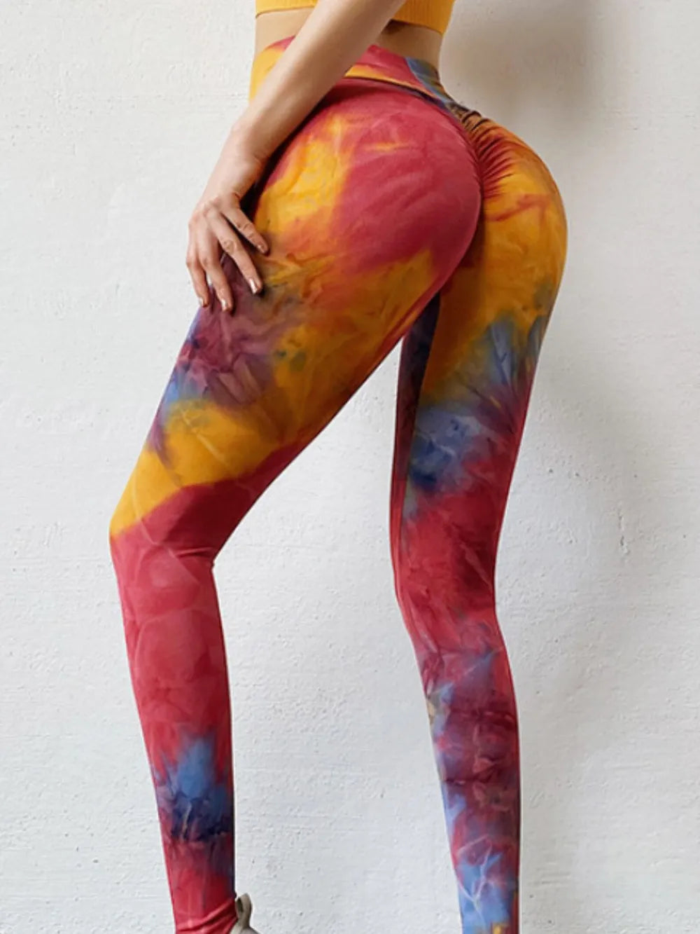 Woman wearing Tie-Dye High Waist Active Leggings in an active setting