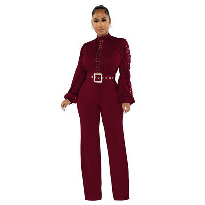 Woman wearing Belted Ruffle Cut-Out Full Length Jumpsuit in a stylish setting