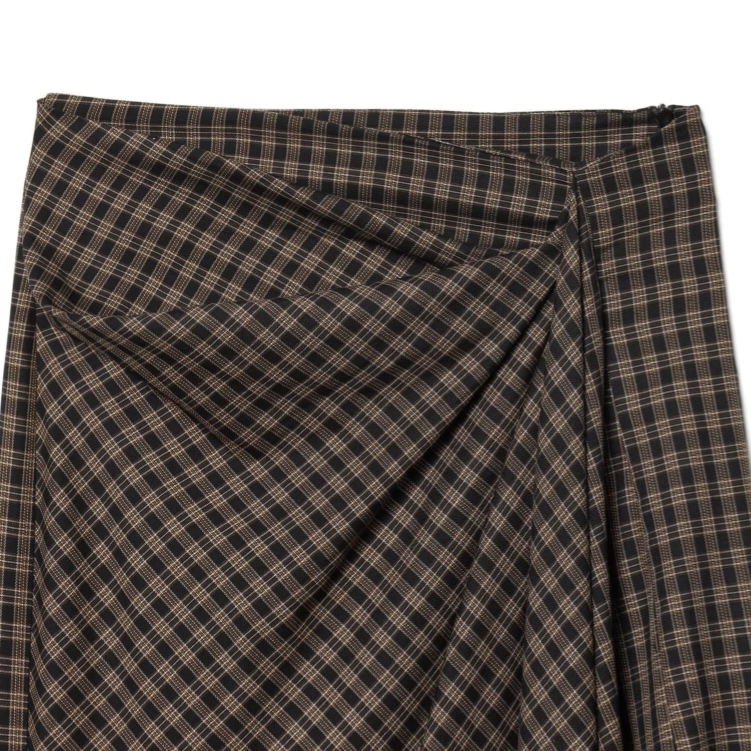 Woman wearing Elegant Plaid Midi Skirt in a stylish outdoor setting