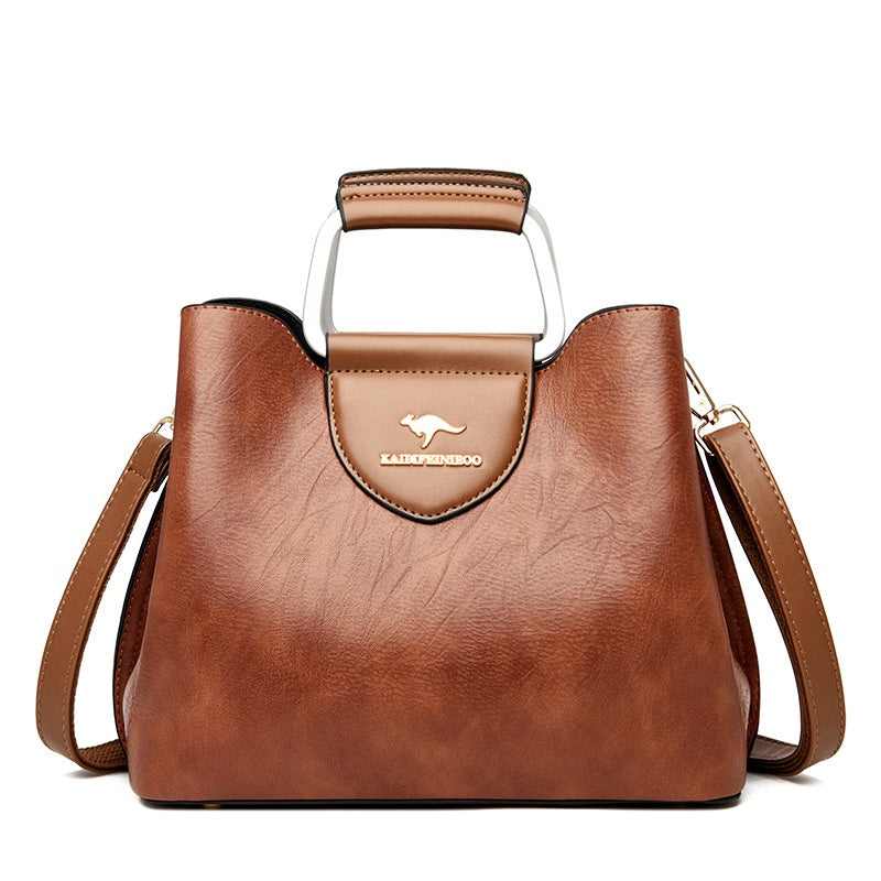 Women's PU Leather Zipper Buckle Crossbody Shoulder Bucket Handbag – Model View | TajStylo