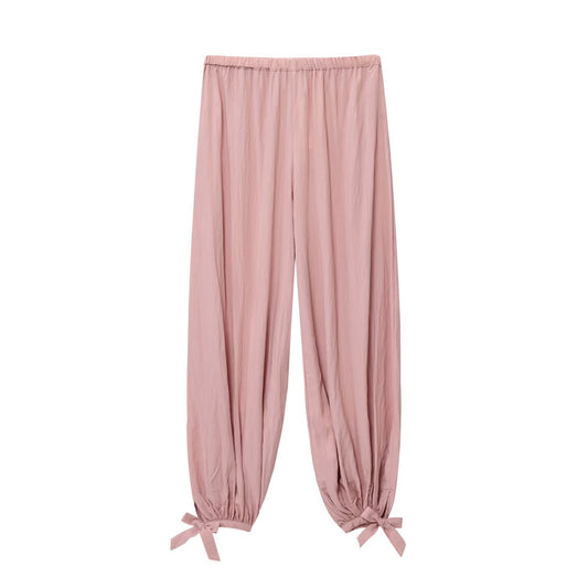 Woman wearing Pink Loose Waist Puffy Pants in a casual setting
