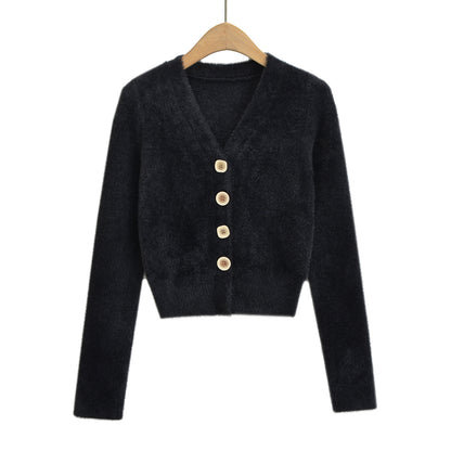 Woman wearing V-Neck Long Sleeve Cardigan Sweater in a chic office setting