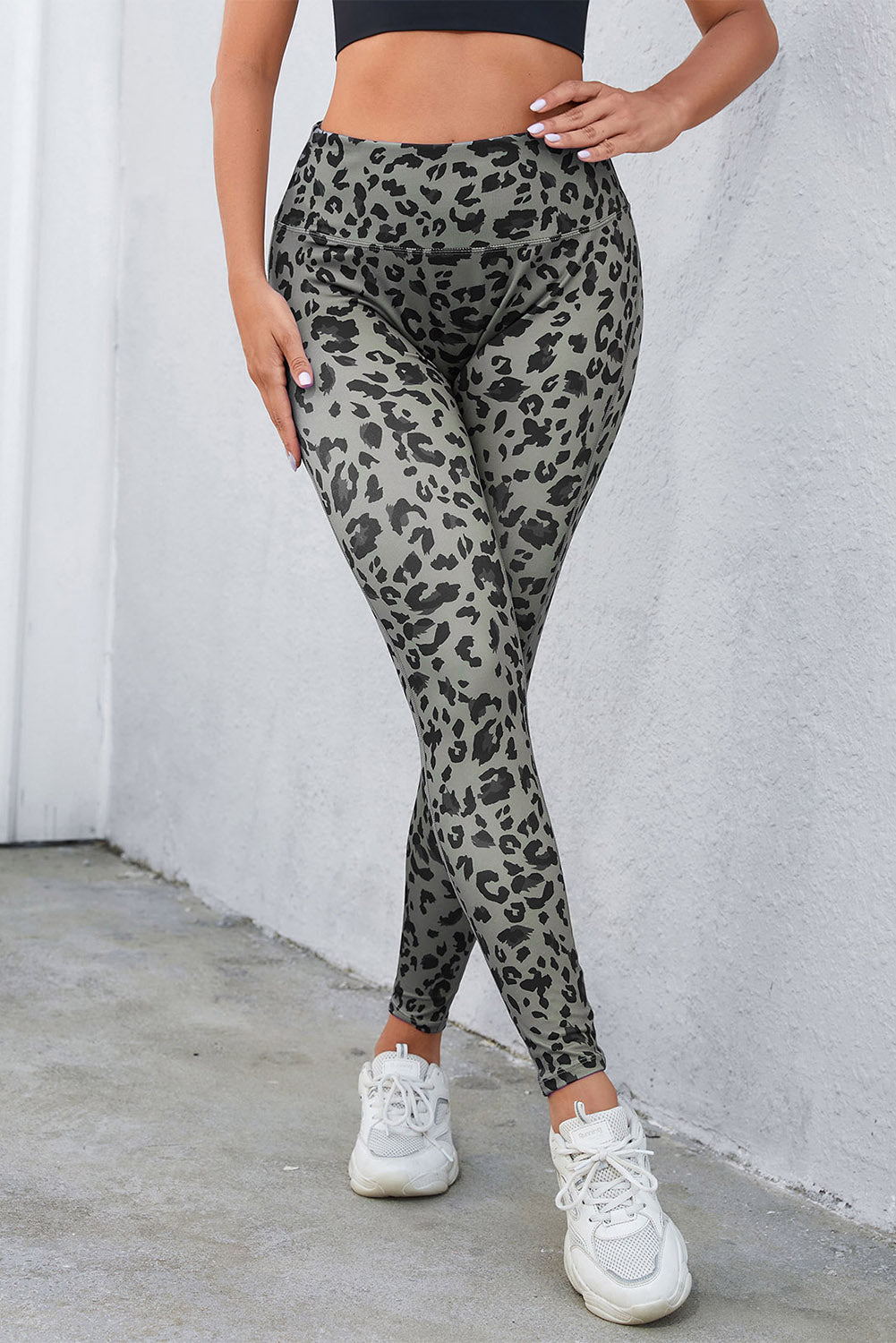 Woman wearing Classic Leopard Print Active Leggings in an urban setting
