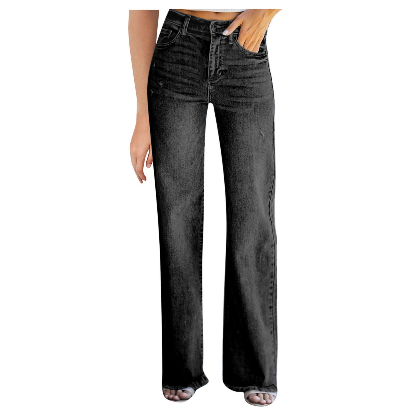 Woman wearing loose denim pants in a casual outdoor setting