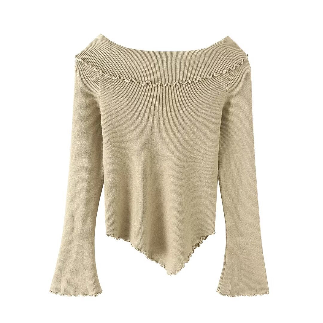 Woman wearing Off Shoulder Long Sleeve Sweater in a casual setting
