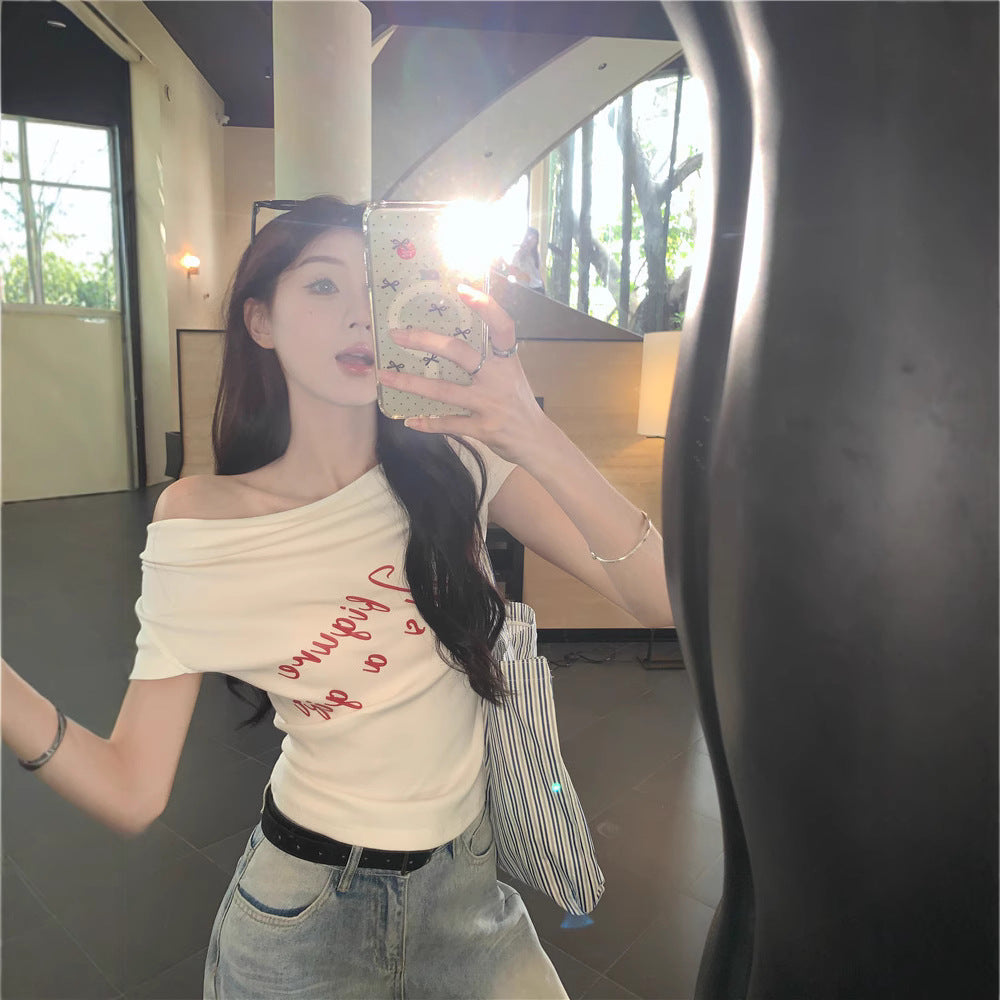 Woman wearing One Shoulder Fitted Crop Top in a casual setting