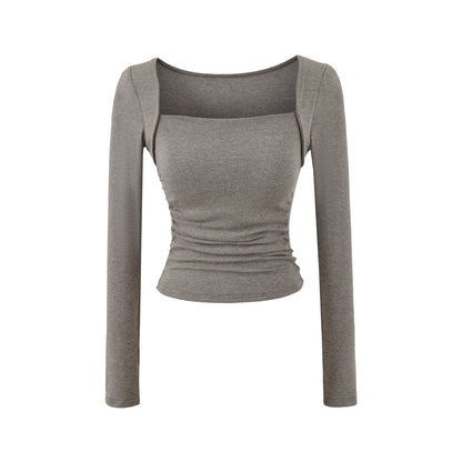 Woman wearing Square Neck Pleated Long Sleeve T-Shirt in a stylish urban setting
