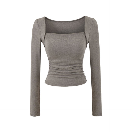 Woman wearing Square Neck Pleated Long Sleeve T-Shirt in a stylish urban setting